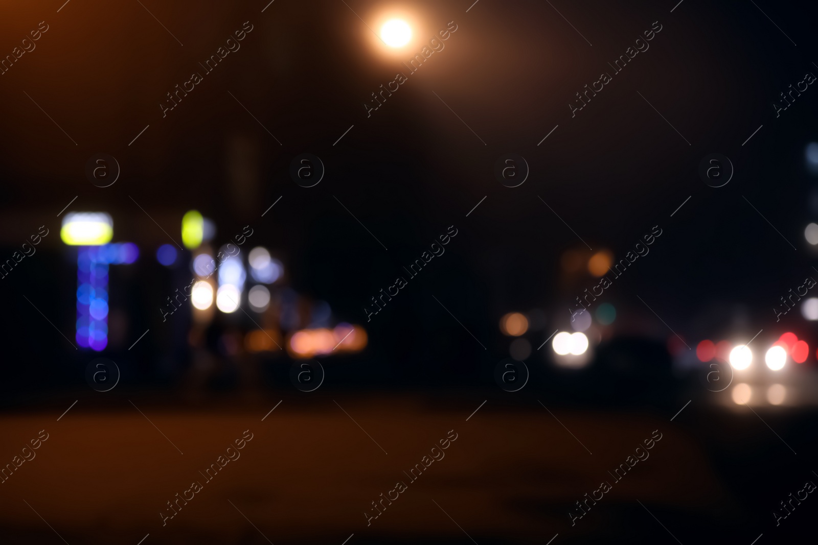 Photo of Blurred view of night city. Bokeh effect