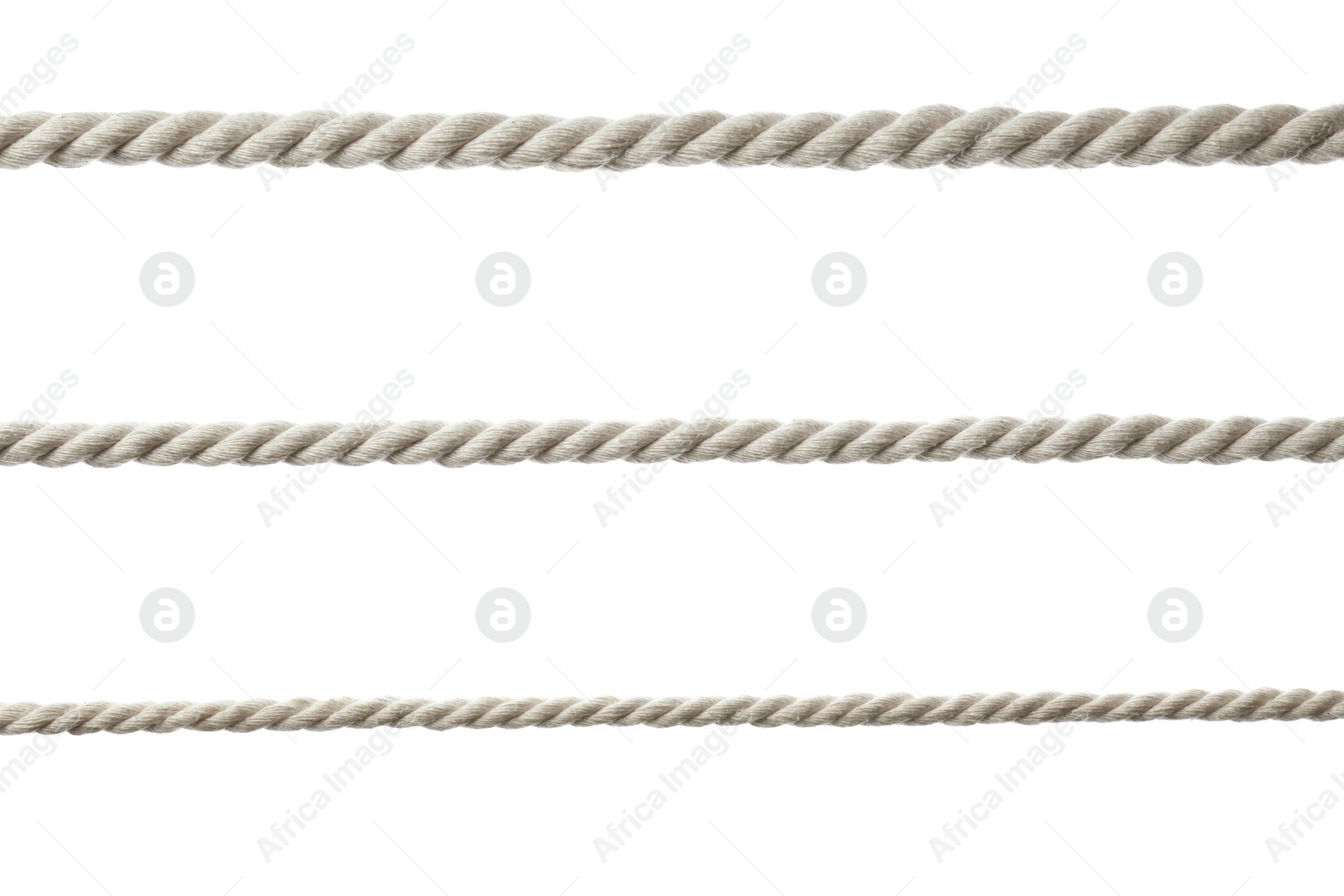 Photo of Cotton ropes on white background. Organic material