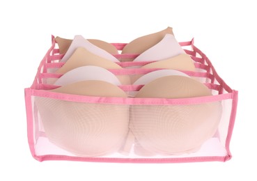 Photo of Transparent organizer with bras isolated on white