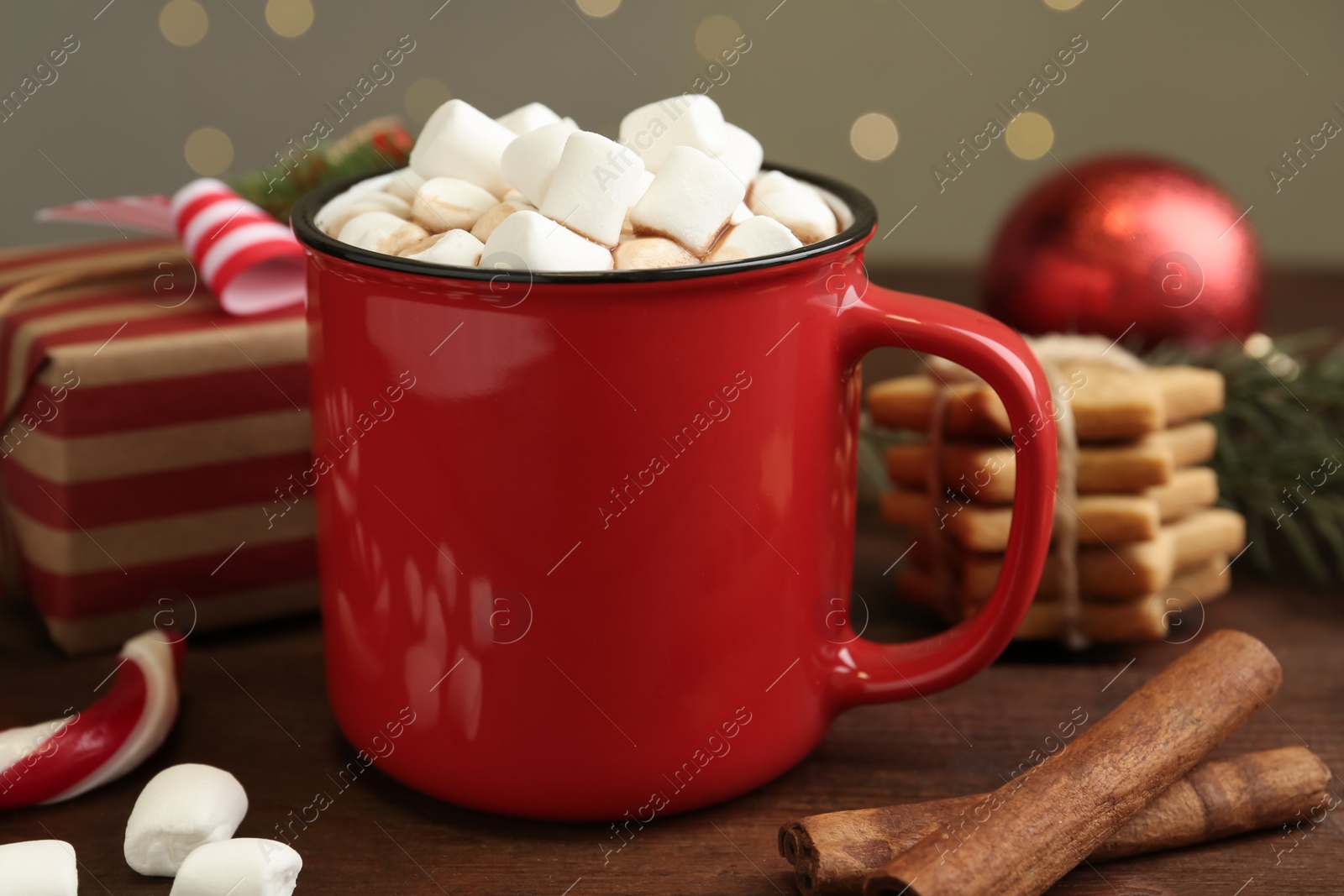 Photo of Composition with delicious marshmallow cocoa on wooden table