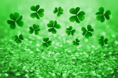 Image of St. Patrick's Day greeting card design with clover leaves, bokeh effect