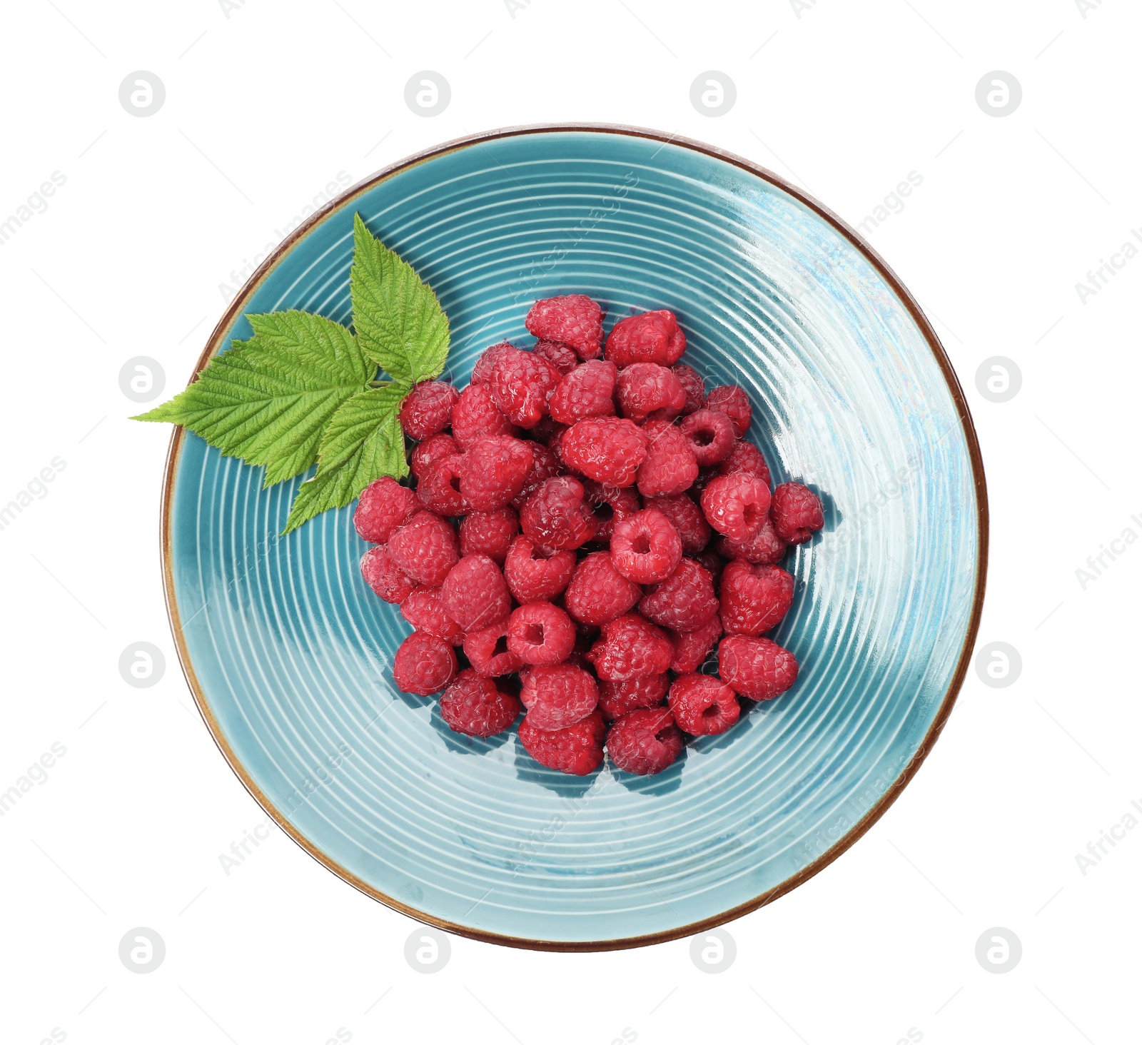 Photo of Plate with ripe raspberries on white background, top view