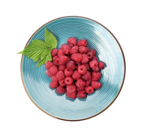 Plate with ripe raspberries on white background, top view