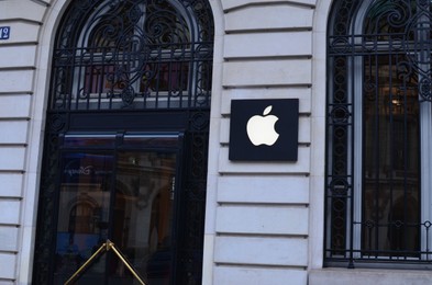 Paris, France - December 10, 2022: Signboard of Apple store on building exterior