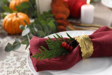 Photo of Beautiful autumn table setting with floral decor, closeup
