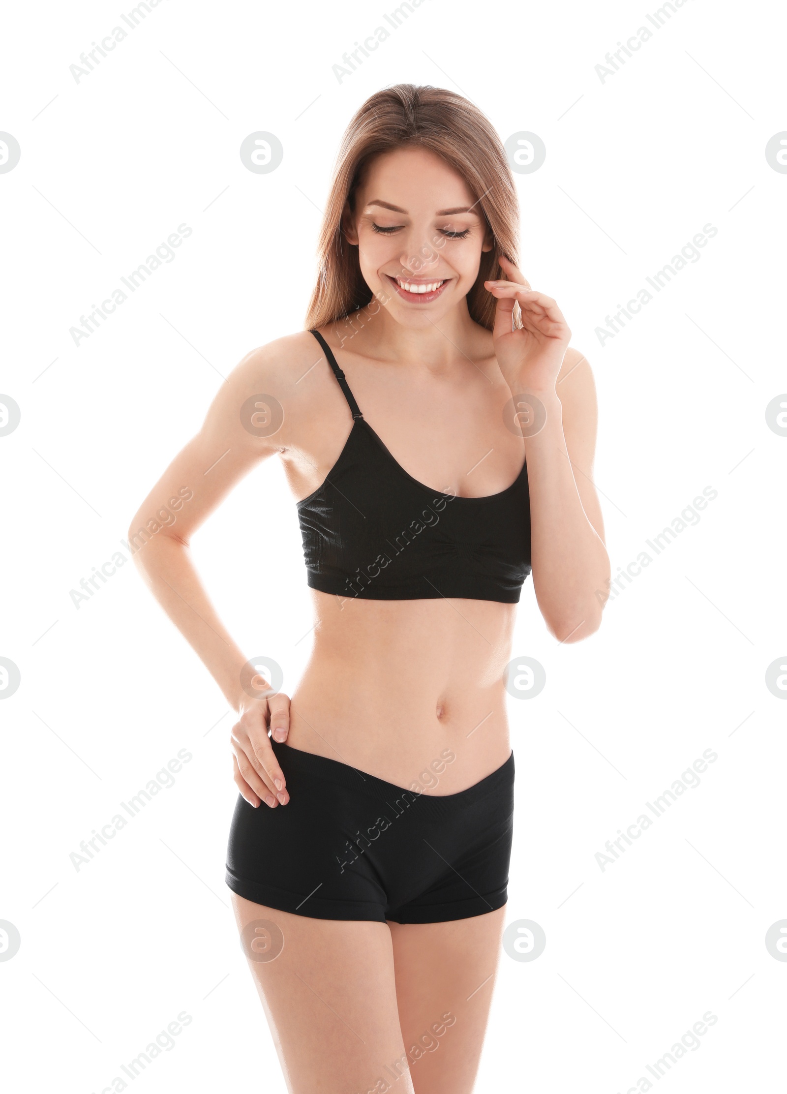 Photo of Young slim woman on white background. Perfect body