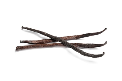 Photo of Aromatic vanilla sticks on white background