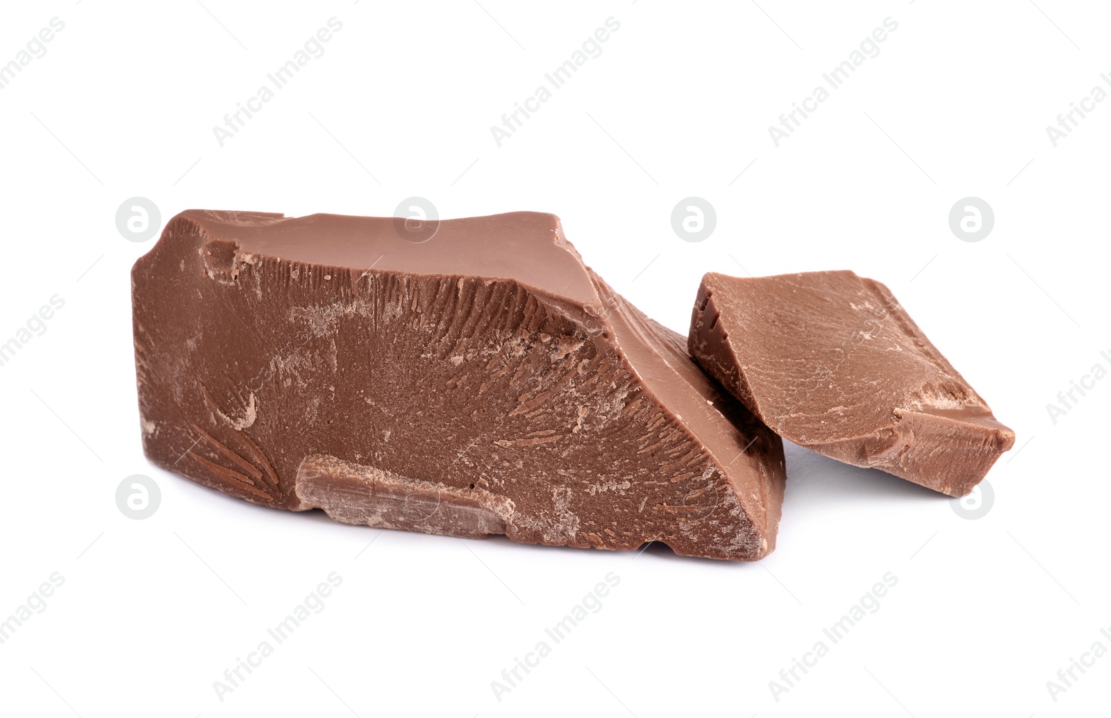 Photo of Pieces of tasty milk chocolate isolated on white