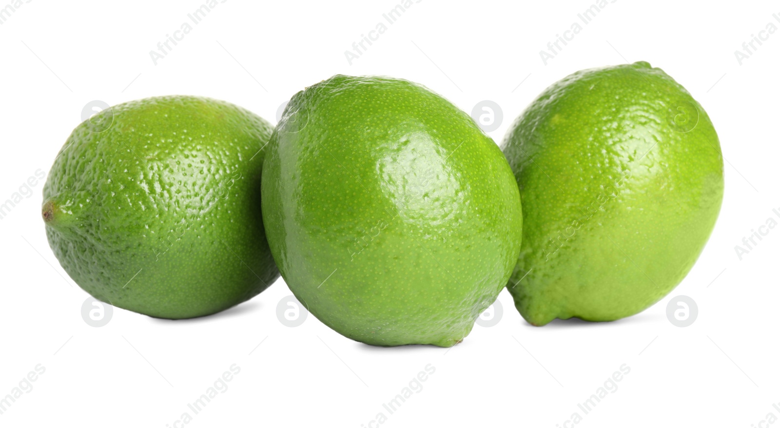 Photo of Fresh green ripe limes isolated on white