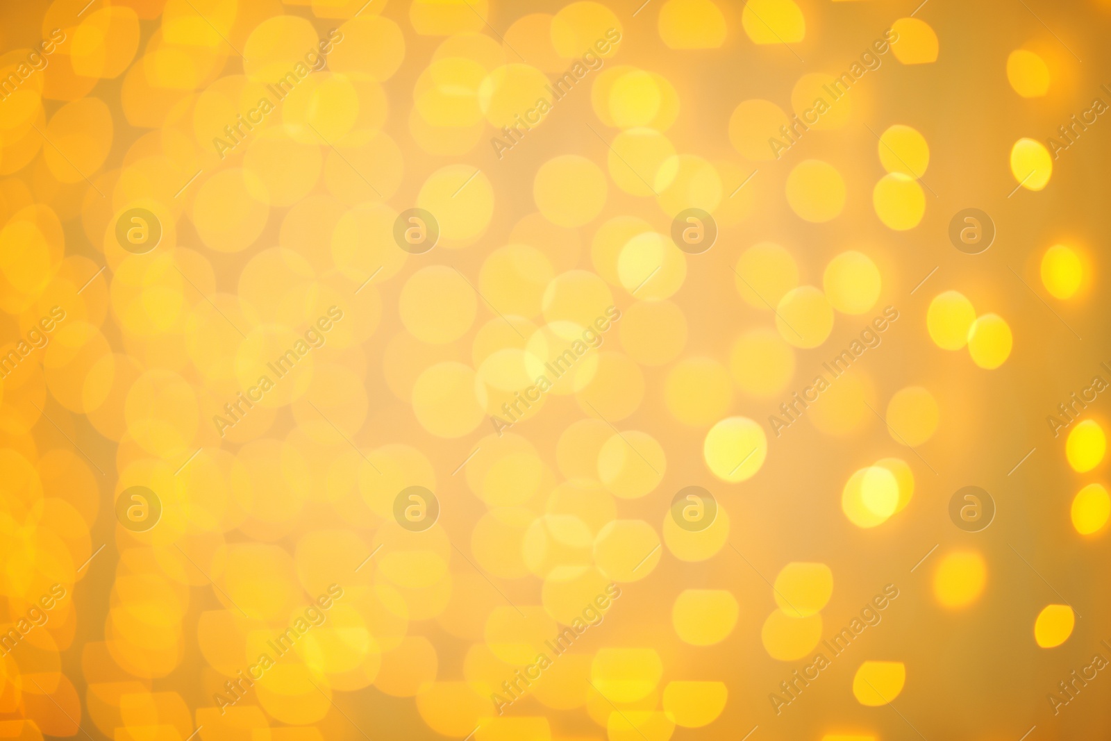 Photo of Beautiful gold lights as background. Bokeh effect