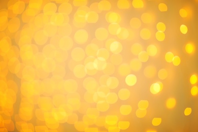 Photo of Beautiful gold lights as background. Bokeh effect