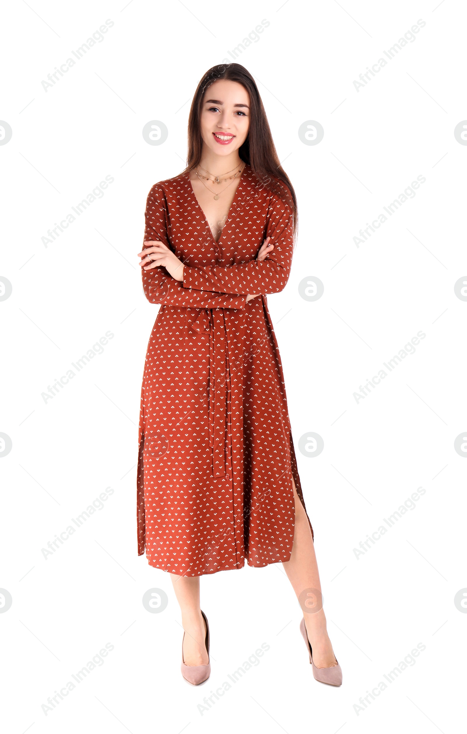 Photo of Portrait of beautiful young woman in stylish dress on white background