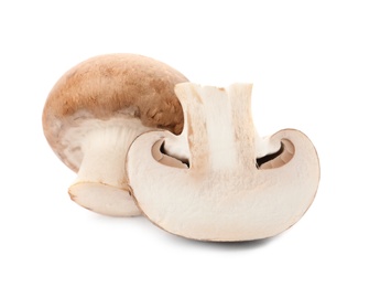 Photo of Fresh raw champignon mushrooms on white background