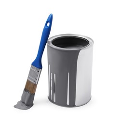 Photo of Can with grey paint and brush on white background