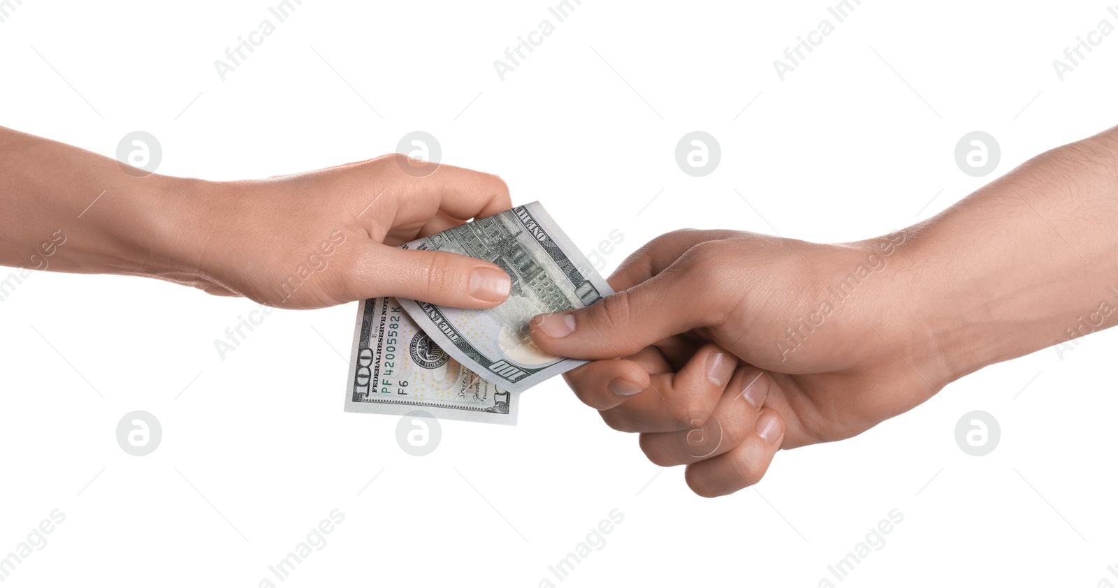 Photo of Money exchange. Man giving dollar banknote to woman on white background, closeup