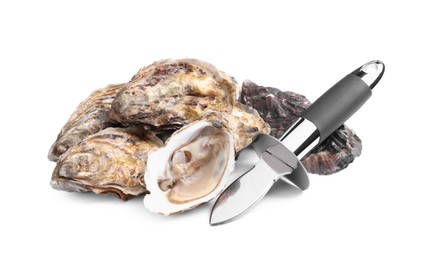 Fresh raw oysters and knife on white background