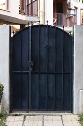 View of external metal door near house outdoors