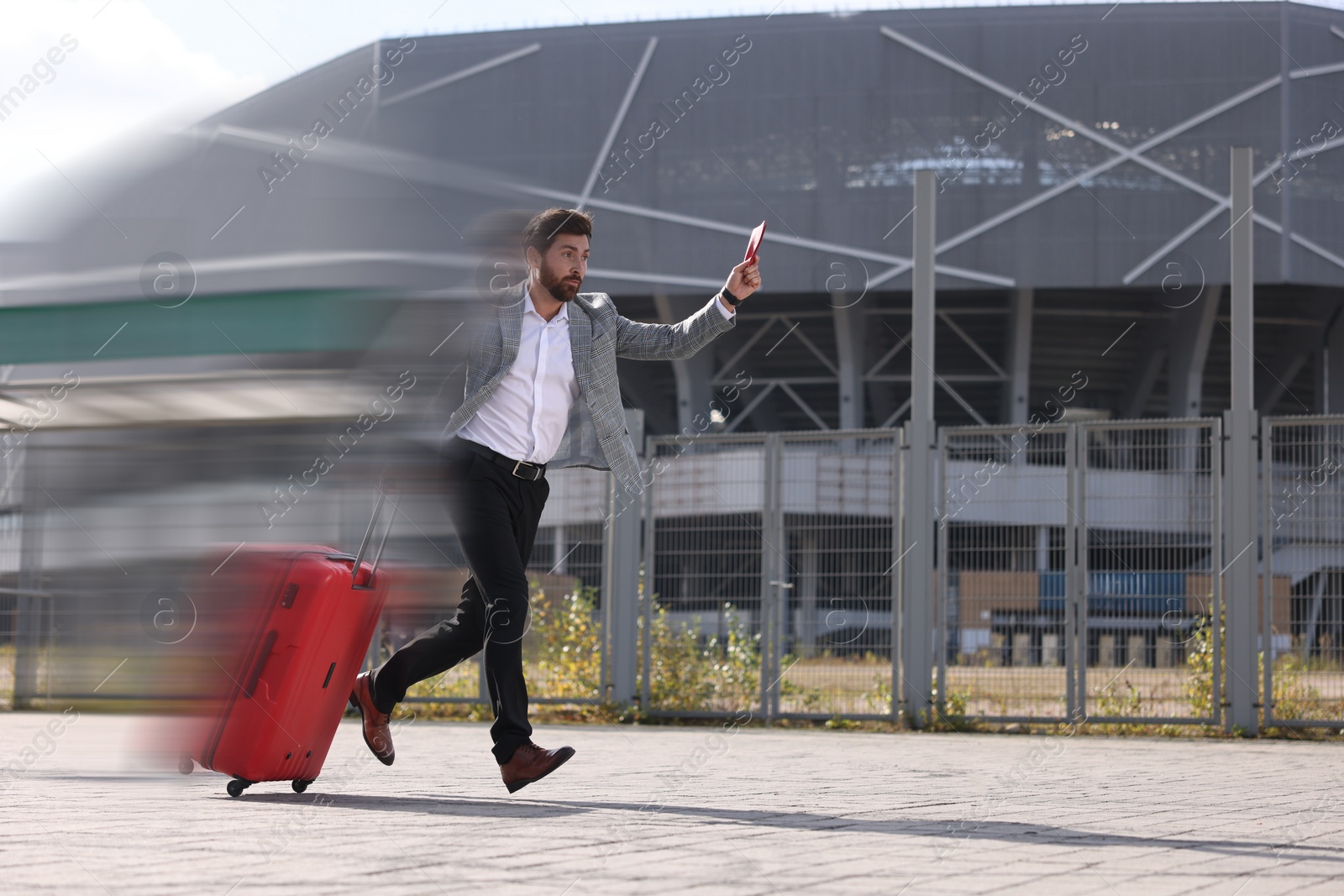 Image of Being late. Businessman with suitcase and ticket running at station. Motion blur effect