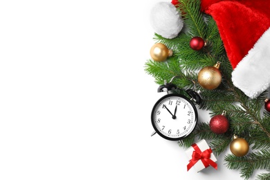 Photo of Retro alarm clock and different decor on white background, top view. Christmas countdown