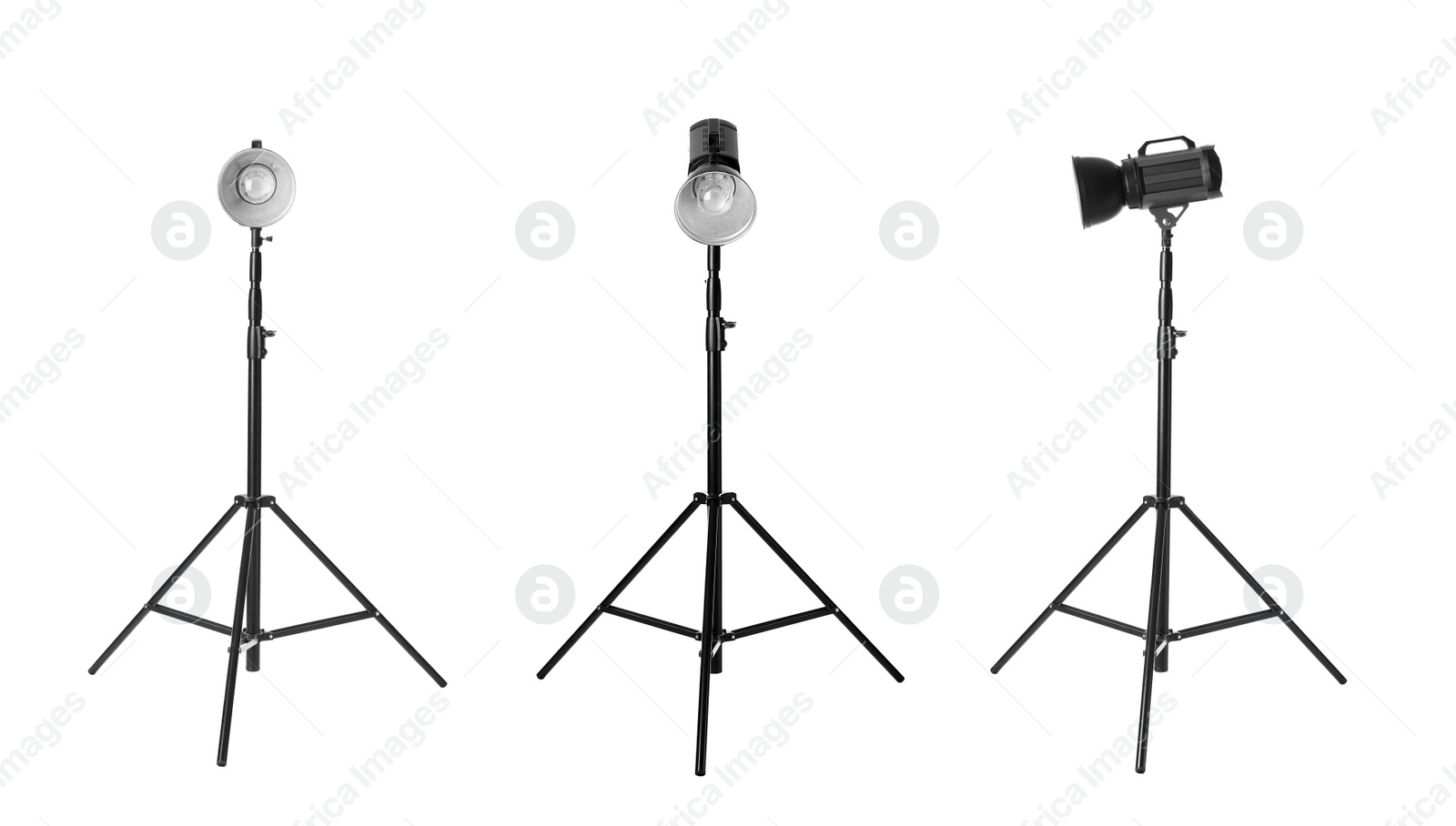 Image of Set with studio flash lights on tripods against white background. Banner design