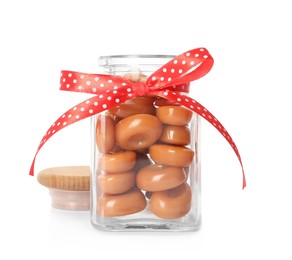 Photo of Sweet candies in jar on white background