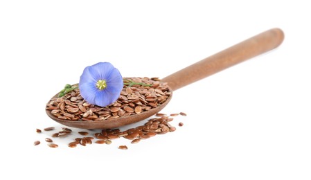 Wooden spoon with flax flower and seeds on white background
