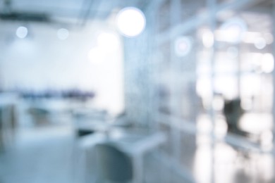 Image of Office interior. Blurred view of comfortable workspace