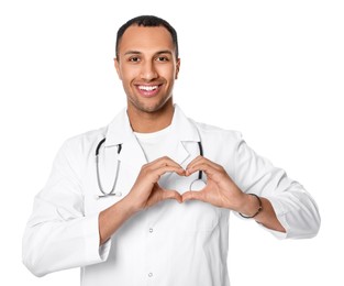 Doctor or medical assistant (male nurse) making heart with hands on white background