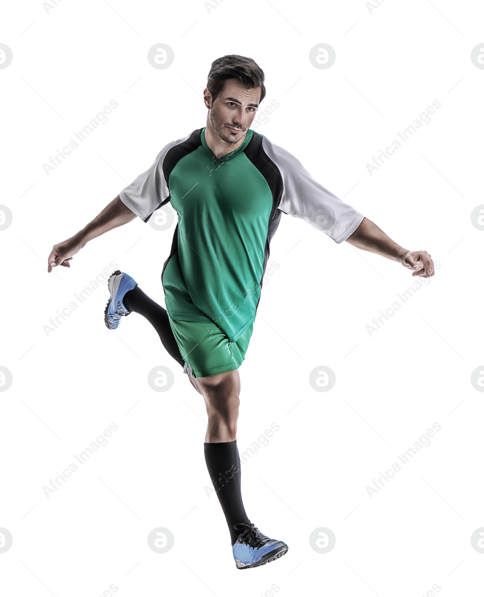 Image of Young man playing football on white background