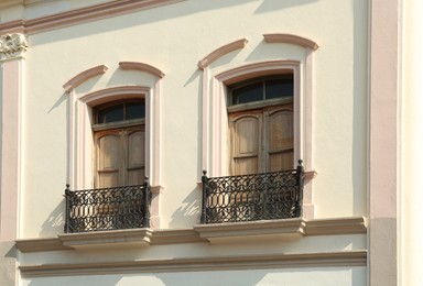 Photo of Exterior of building with windows and balconies