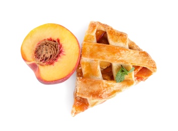 Photo of Slice of delicious peach pie and fresh fruit isolated on white, top view