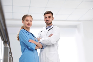 Photo of Portrait of doctors in uniform at workplace