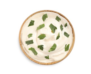 Photo of Mayonnaise with parsley in wooden bowl isolated on white top view
