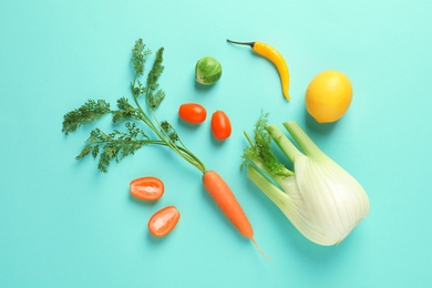 Photo of Flat lay composition with fresh fruits and vegetables on color background