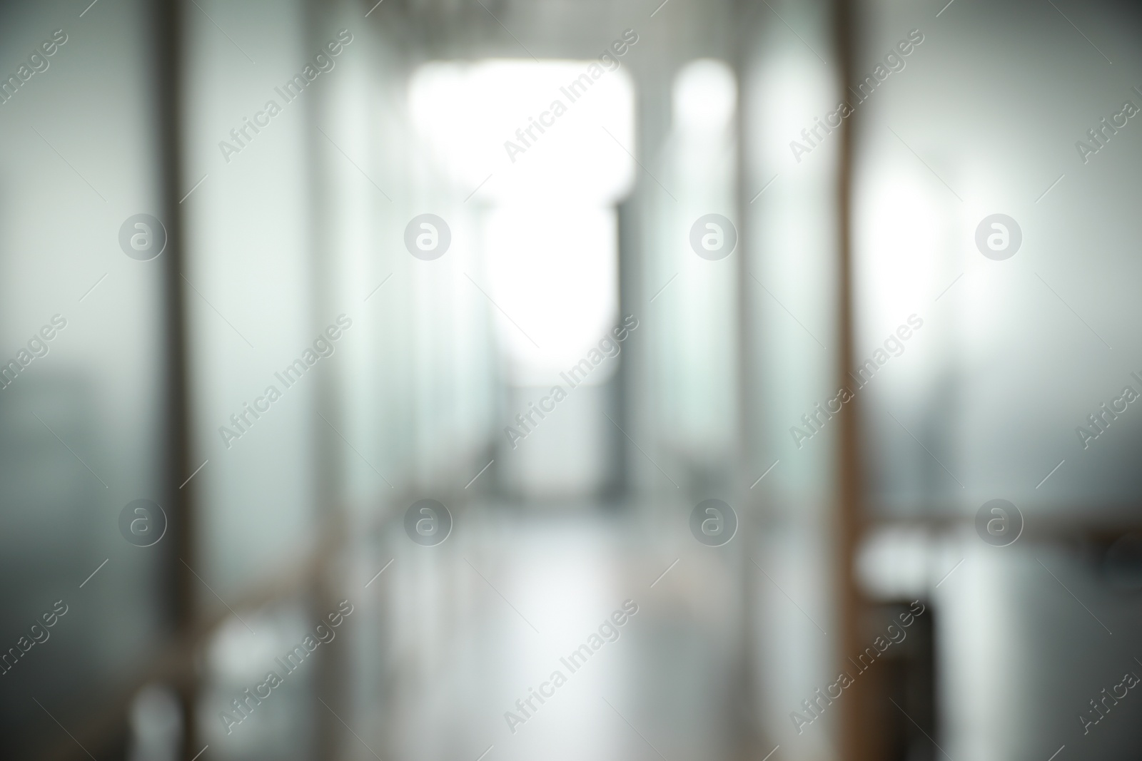 Photo of Blurred view of empty corridor in company