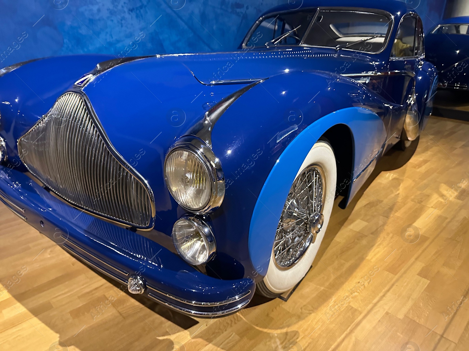 Photo of Hague, Netherlands - November 8, 2022: Beautiful view of blue retro car in Louwman museum