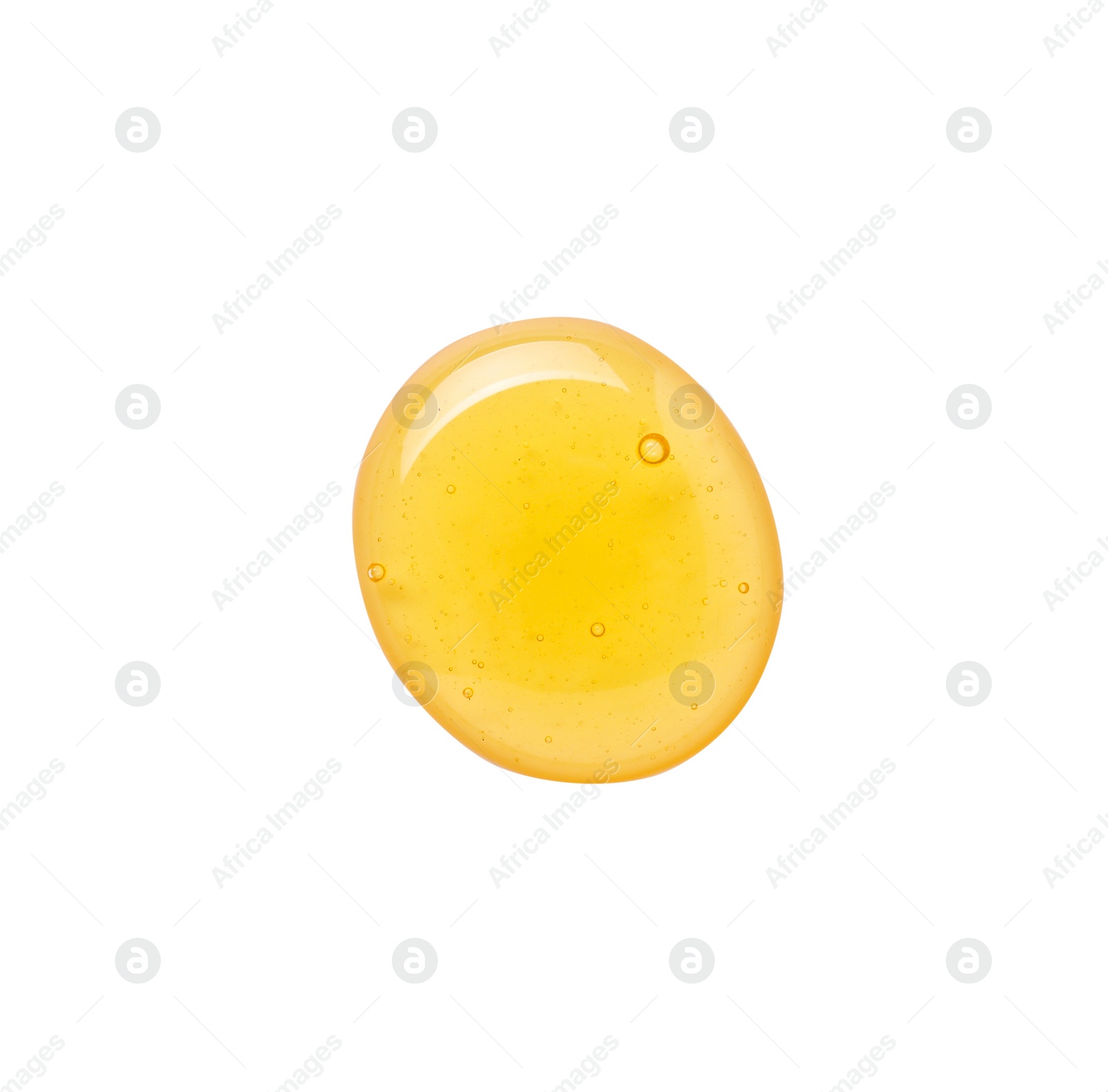 Photo of Drop of tasty natural honey isolated on white, top view