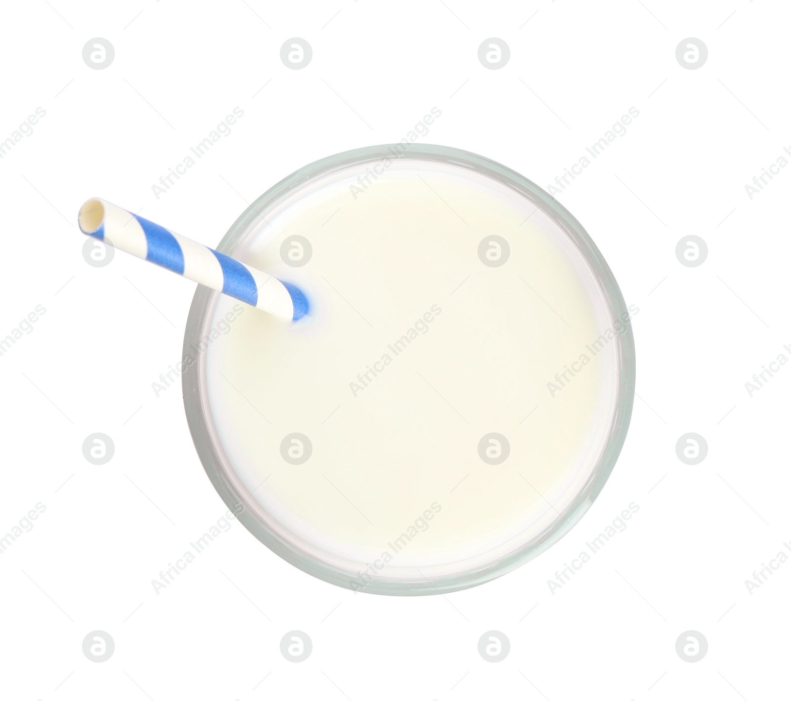 Photo of Glass of milk with straw on white background, top view