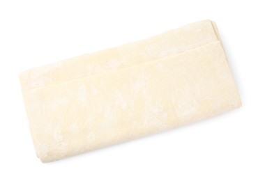 Photo of Raw puff pastry dough isolated on white, top view