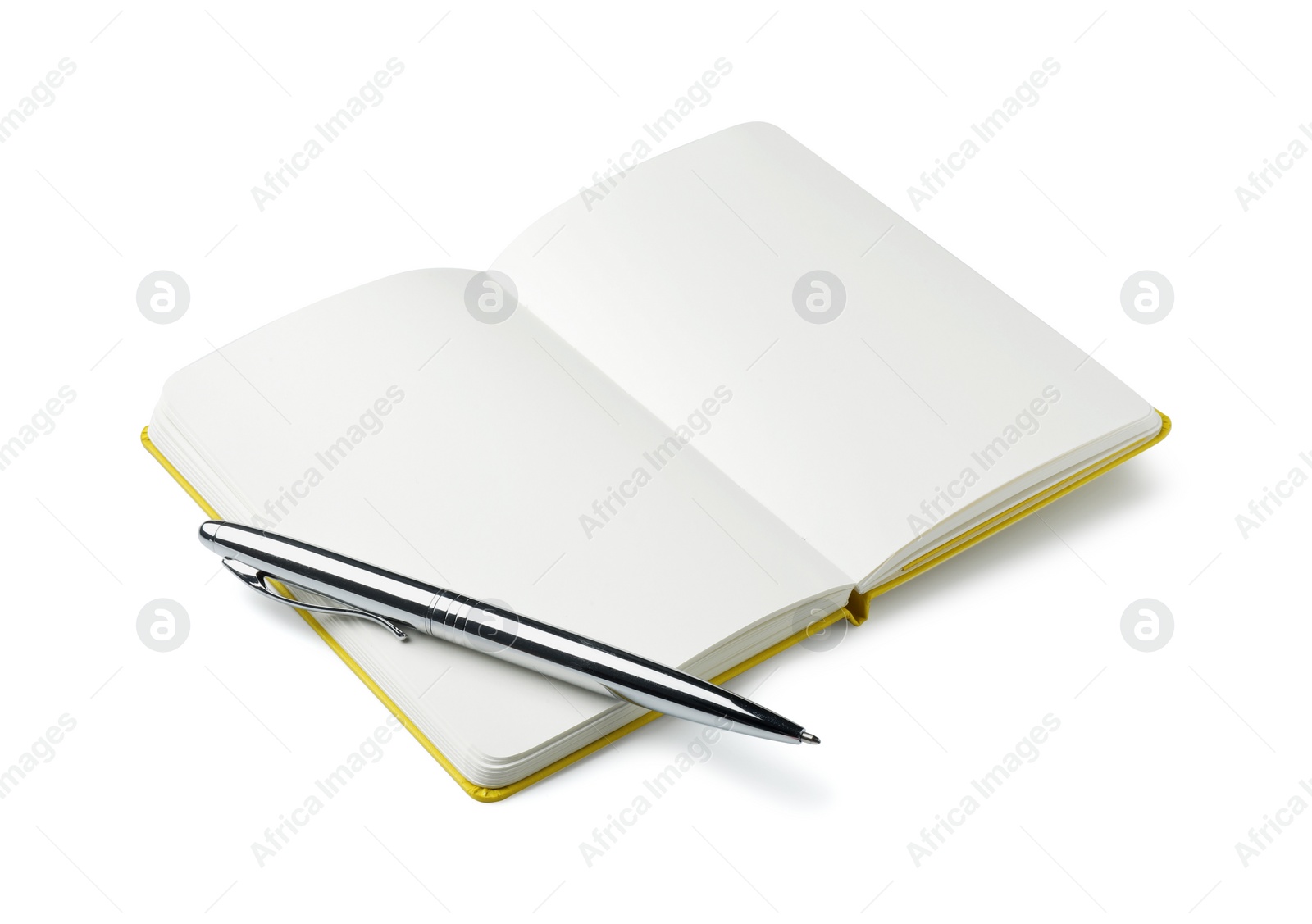 Photo of Open notebook with blank pages and pen isolated on white