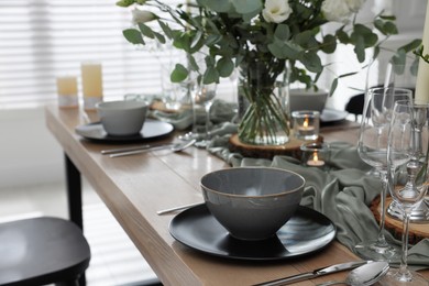 Festive table setting with beautiful tableware and decor indoors