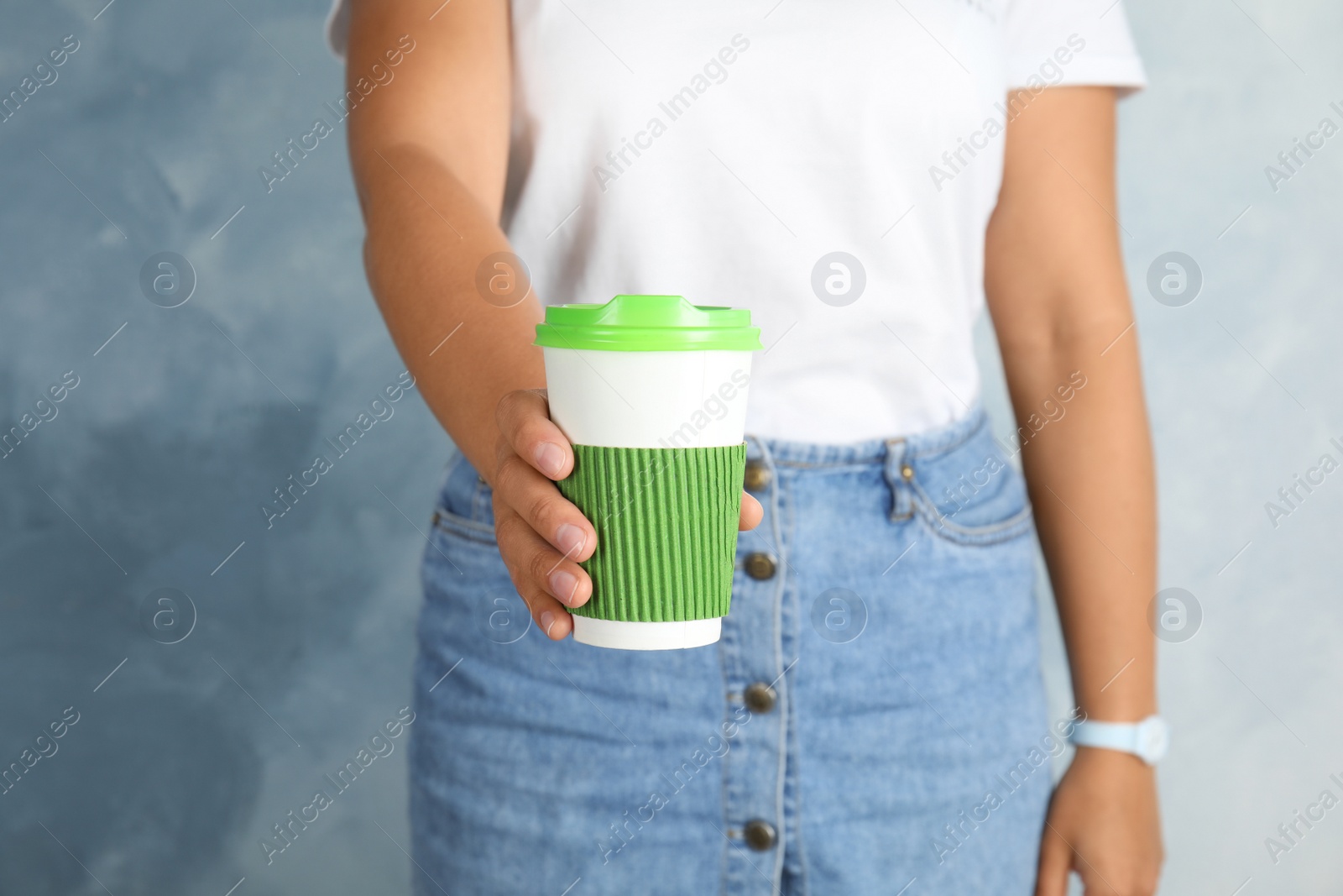 Photo of Woman with carton cup, closeup. Mock up for design