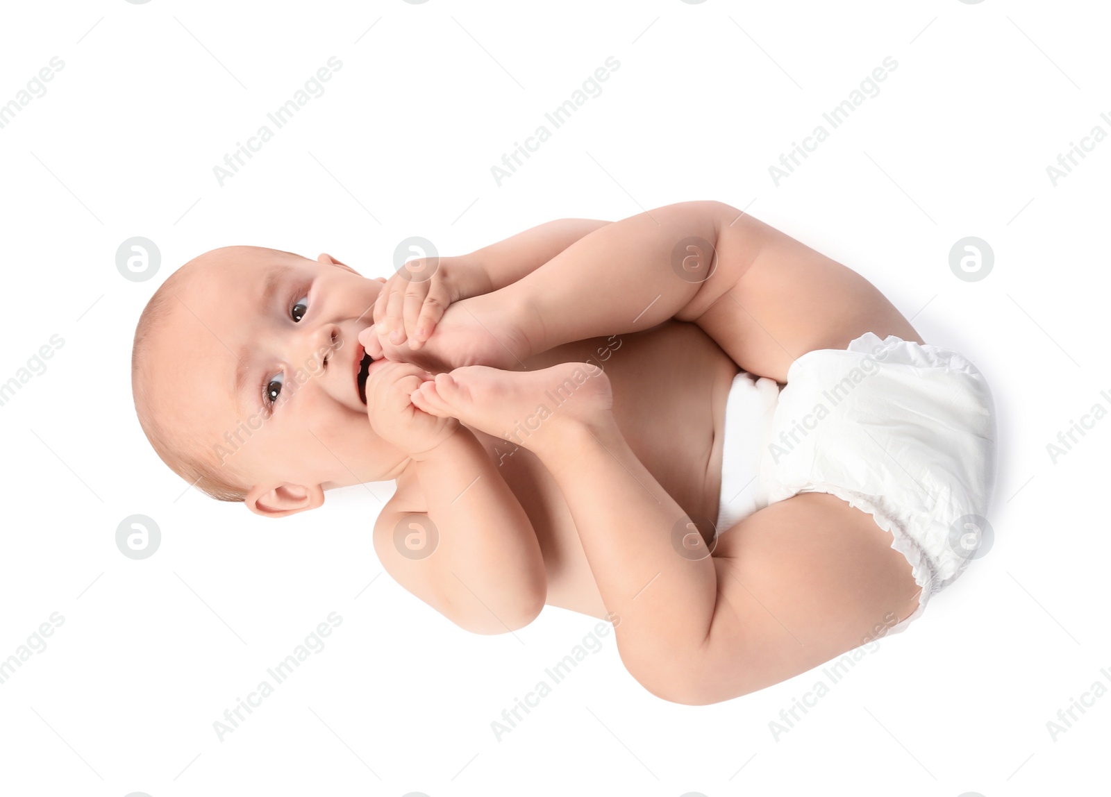 Photo of Cute little baby lying on white background, top view