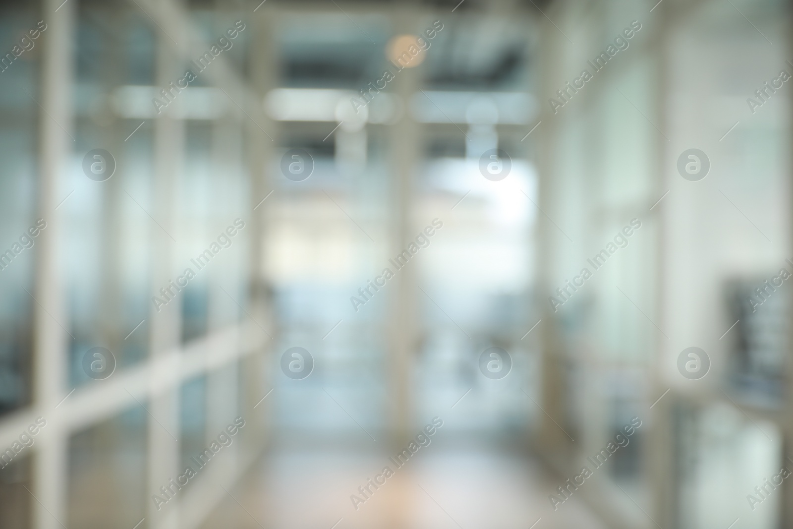 Photo of Blurred view of empty corridor in company