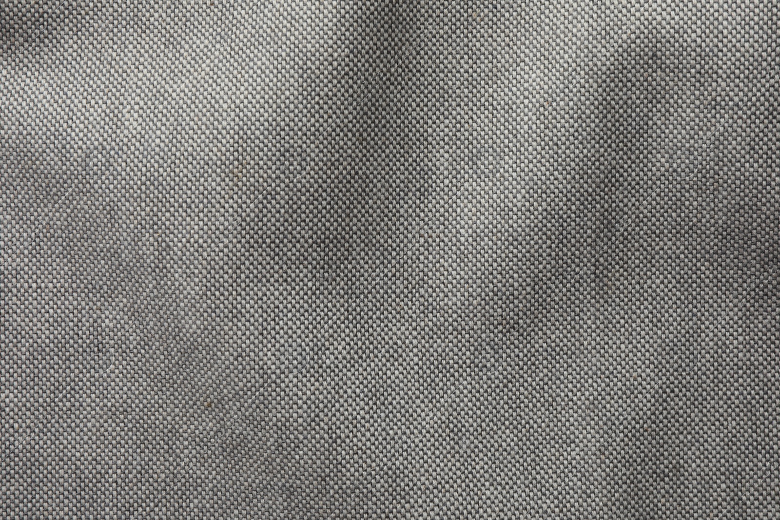 Photo of Texture of grey fabric as background, top view