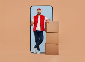 Courier with parcels near huge smartphone on dark beige background. Delivery service