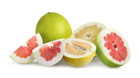 Image of Cut and whole fresh pomelo fruits on white background