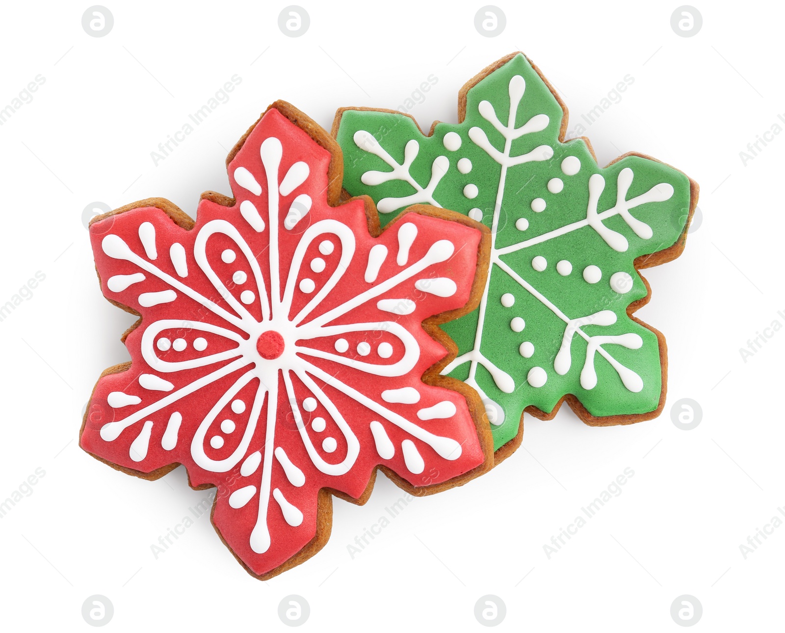 Photo of Tasty Christmas cookies in shape of snowflakes isolated on white, top view