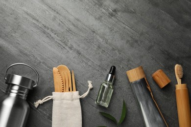 Flat lay composition with eco friendly products on grey background, space for text. Conscious consumption