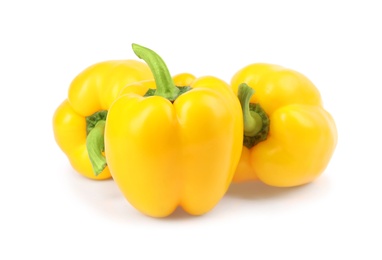 Ripe yellow bell peppers isolated on white